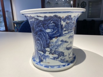 A fine Chinese blue, white and copper red 'Master of the Rocks' brush pot, Kangxi